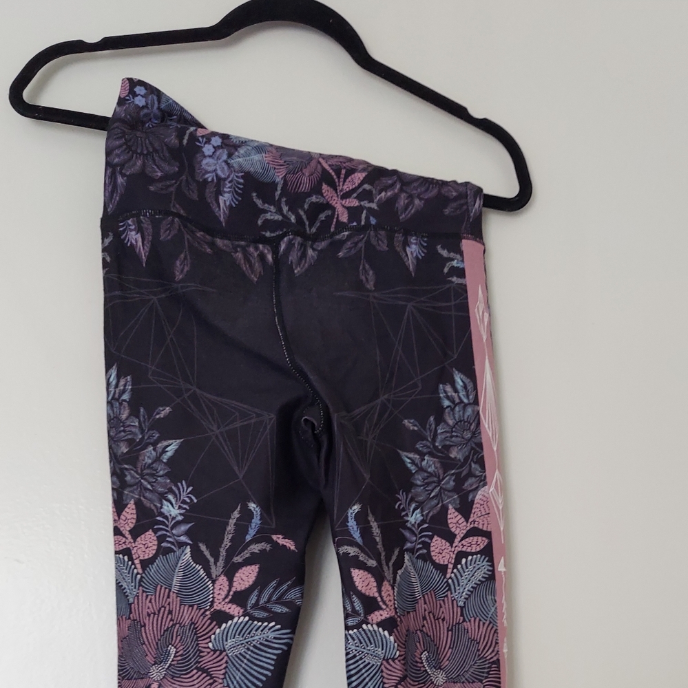 Black floral leggings by Evolution and Creation